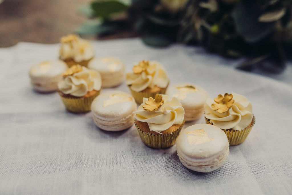 wedding planning mini cakes macarons gold leaf ivory buttercream gold flowers