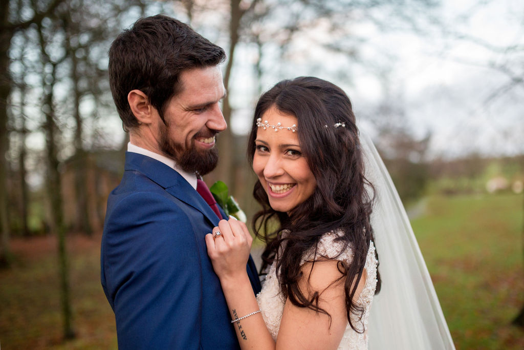 wedding checklist bride and groom close up smiling embracing