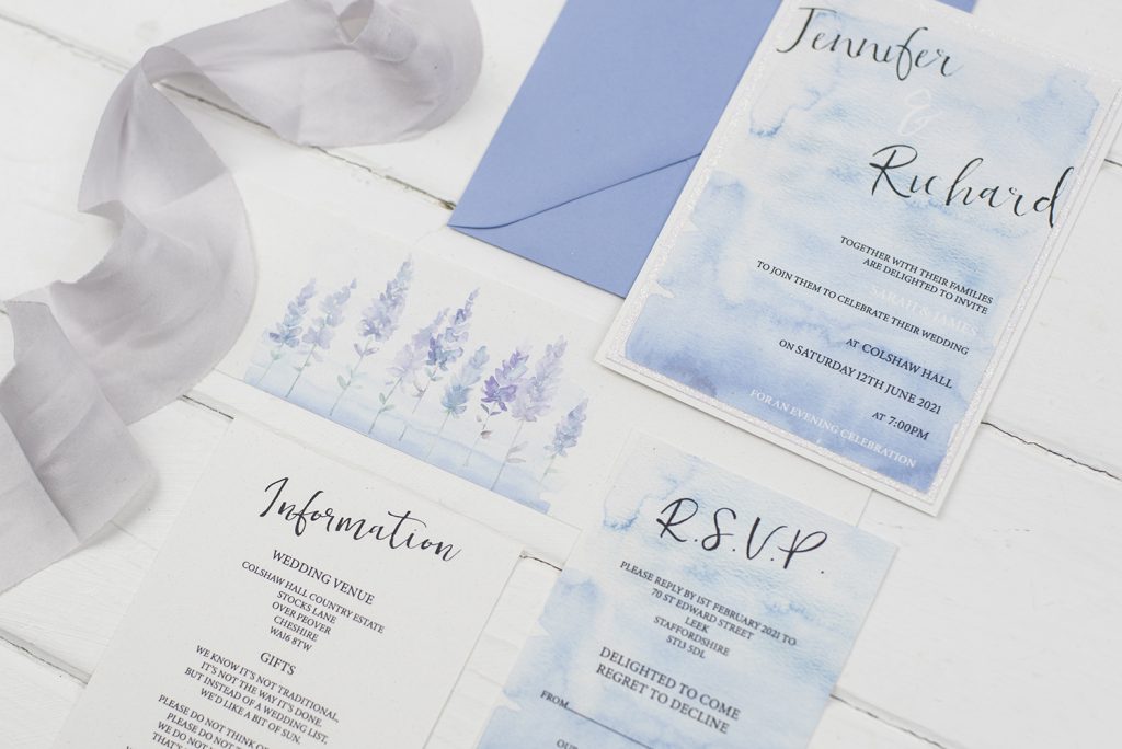 diy wedding invitations flay lay invitation information rsvp belly band silk ribbon white lavendar 